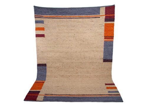 Handwoven Moroccan wool rug with vibrant geometric patterns, blending tradition and modern aesthetics for a stylish addition to any home