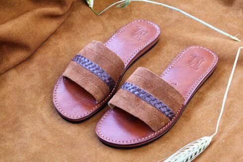 A unique blend of soft suede and braided leather, these artisan-made slides bring Moroccan tradition into everyday comfort.