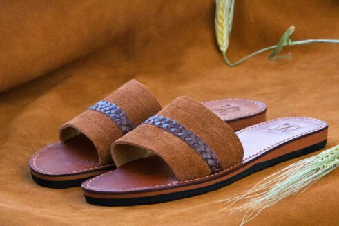 A unique blend of soft suede and braided leather, these artisan-made slides bring Moroccan tradition into everyday comfort.