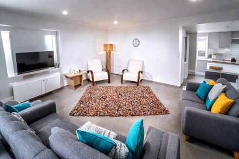 Handcrafted Moroccan multi-color wool rug with a rich, textured surface that brings warmth and style to any space