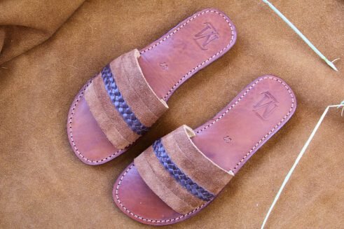 A unique blend of soft suede and braided leather, these artisan-made slides bring Moroccan tradition into everyday comfort.