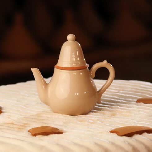 Cream ceramic teapot